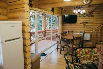 Фото номера Дом с 4 спальнями Дома для отпуска Forest House г. Мигово 14
