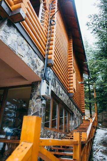 Фото номера Дом с 4 спальнями Дома для отпуска Forest House г. Мигово 7