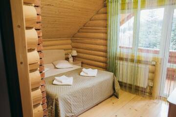 Фото номера Дом с 4 спальнями Дома для отпуска Forest House г. Мигово 61